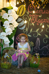 little girl with a basket of flowers