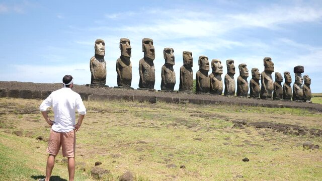 Moai statues in Ahu Tongariki. Statues of Easter Island in Chile. Mysterious Giant megalith Moai statues. Stunning shot of mysterious monoliths on a perfect sunny day.