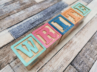 Write. The word write from wooden letter blocks. Fit for educational media, teaching, childrens book, etc