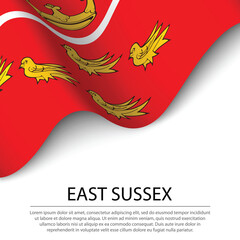 Waving flag of East Sussex is a county of England on white backg