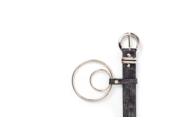 Women's belt made of faux snakeskin with metal buckle and original decoration.