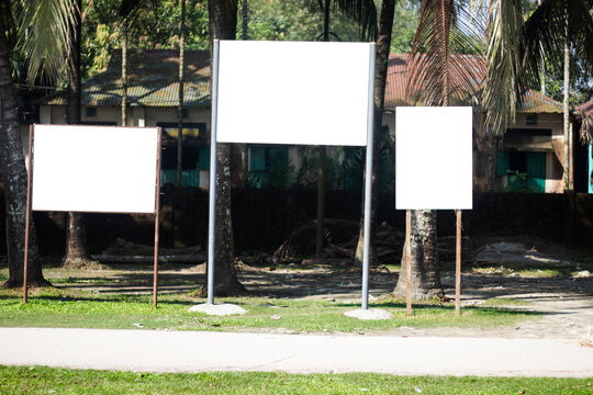 Four White Billboards Blank In The Open Park For Advertisement