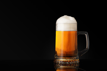 full mug of beer and foam