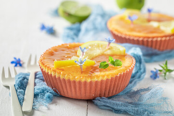 Tasty and homemade lemon cheesecake with yellow jelly.