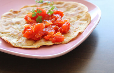 Whole wheat flour crepe with tomato sauce, healthy breakfast food