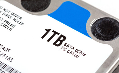 1 TB hard drive storage space , simple one terabyte 2.5 inch HDD object macro, extreme closeup,...