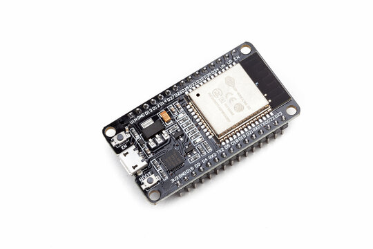 Espressif ESP32 series micro controller module, Wi-Fi Bluetooth development board, system on a chip. Object up close, isolated on white, cut out, nobody