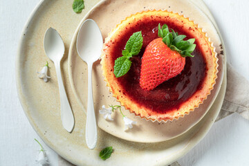 Homemade strawbery cheesecake with fresh fruits. Sweet summer cheesecake.