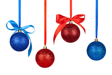 set of ornaments balls red and blue with ribbon and bow isolate