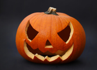 Halloween pumpkin isolated on black background.