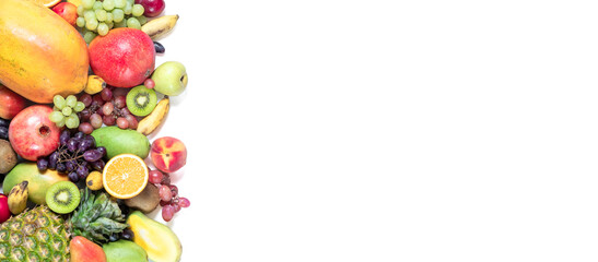 Mixed fruits and berries on white background, top view, banner. Healthy eating, dieting concept