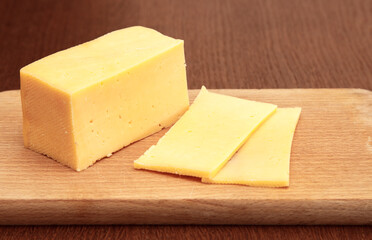 slices of cheese on a cutting board