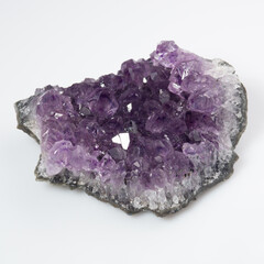 natural violet amethyst druse cluster on the white background