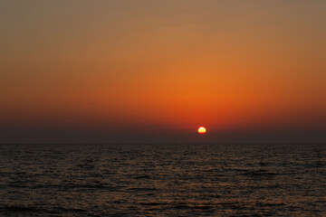sunset sea in Miami,beautiful sun sets over the horizon into the ocean