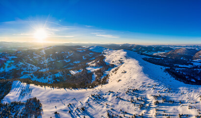 Magical winter panorama of beautiful snowy slopes