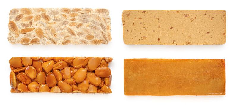 Collection of Turron nougat - traditional Spanish almond dessert isolated on white background. Christmas Turron candy.