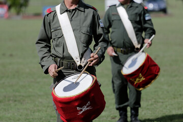 Military band playing the drum. Military playing music with drums. Close up. Uniforms and...