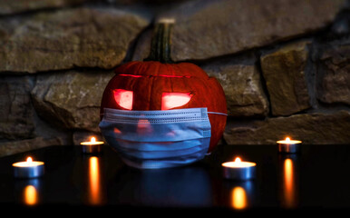 halloween pumpkin and medical mask