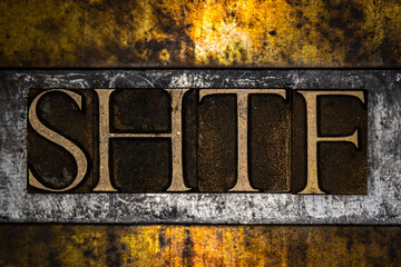 SHTF text on vintage textured grunge copper and gold background