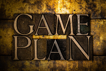 Game Plan text message on textured grunge copper and vintage gold background