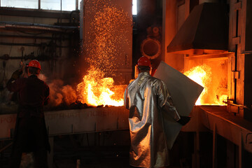 Work in a foundry with molten iron