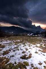 First snow in Bieszczady mountains in Poland. Storm is coming. 