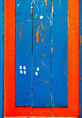 Blue and red wooden board lumber.