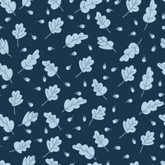 Seamless pattern with yellow oak leaves and acorns on dark blue background. Autumn concept. For surface design and other design projects