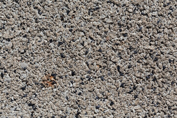 Crushed granite stones wall - close up