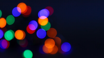 christmas lights with bokeh effect on black background