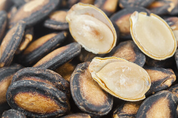 Black dry watermelon seeds texture.