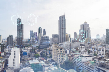 Naklejka na ściany i meble Technology hologram over panorama city view of Bangkok. The largest tech hub in Southeast Asia. The concept of developing coding and high-tech science. Double exposure.