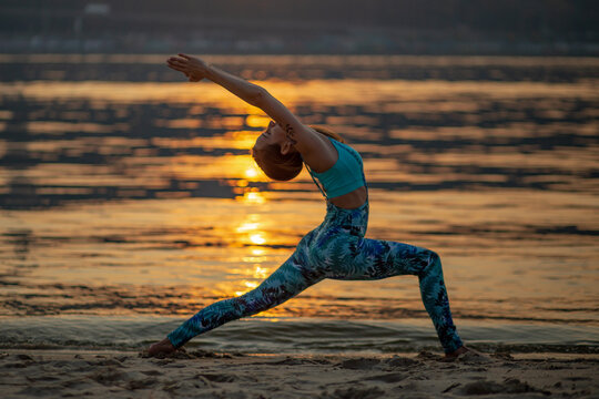sunset, yellow river, beach autumn yoga, virabhadrasana, balance, fitness, stretching and relaxation	