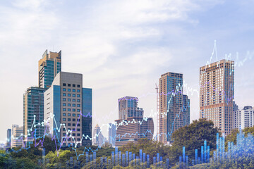 Fototapeta na wymiar Financial stock chart hologram over panorama city view of Bangkok, business center in Southeast Asia. The concept of international transactions. Double exposure.