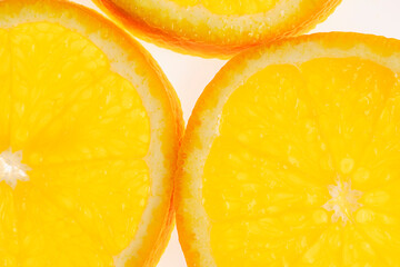 Fresh sliced orange on white.