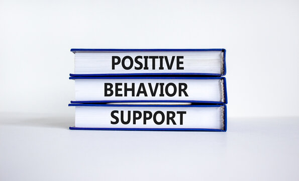 Positive behavior support symbol. Concept words Positive behavior support on wooden books on a beautiful white background. Business, psychological and Positive behavior support concept. Copy space.