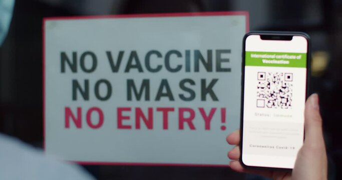 Vaccinated Person Using Digital Health Passport App With Covid-19 Certificate. Proof Of Vaccination. No Vaccine No Mask No Entry Service. Digital Green Certificate Of Immunization With Qr Code