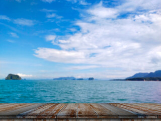 Fototapeta na wymiar wooden table tops on the blurry sea floor.