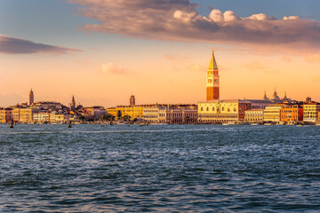Obraz premium Venice city morning sunrise skyline. Cityscape Venice, sea view Piazza San Marco with Campanile, Doge Palace in Venice, Italy.