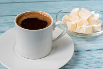 Turkish coffee and a bowl of Turkish delight.