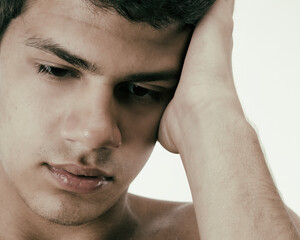 Fototapeta premium Young attractive guy and headache.