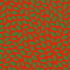 Seamless pattern with Christmas decoration. Green petals on red background.