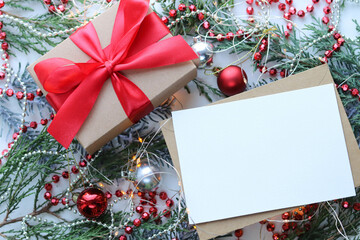 greeting christmas card. christmas background. gift box and Christmas decorations on the background of fir branches © Palanga