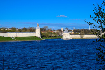 Flat and High towers. Historic site in Pskov. Fortress wall. Pskov Krom. sunny day.