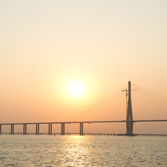 Fototapeta na wymiar Suspension bridge over the sea in China.