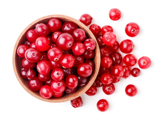 Lingonberries, cowberry in a wooden plate on a white background, isolated. Top view