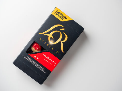 20.10.2021 , Moscow, Russia. Close-up of capsules with ground coffee L'OR Espresso Splendente. Capsules for Nespresso machines. Coffee from France. Top view, flat lay