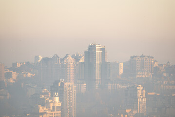 Fototapeta premium Haze in the city at sunrise