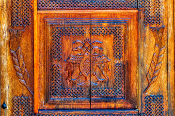 Carved wooden vintage religious decoration inside Orthodox church.