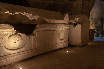 Carved sarcophagus with beautiful designs in the Cave of the Coffins at Bet She'arim in Kiryat Tivon, Israel
